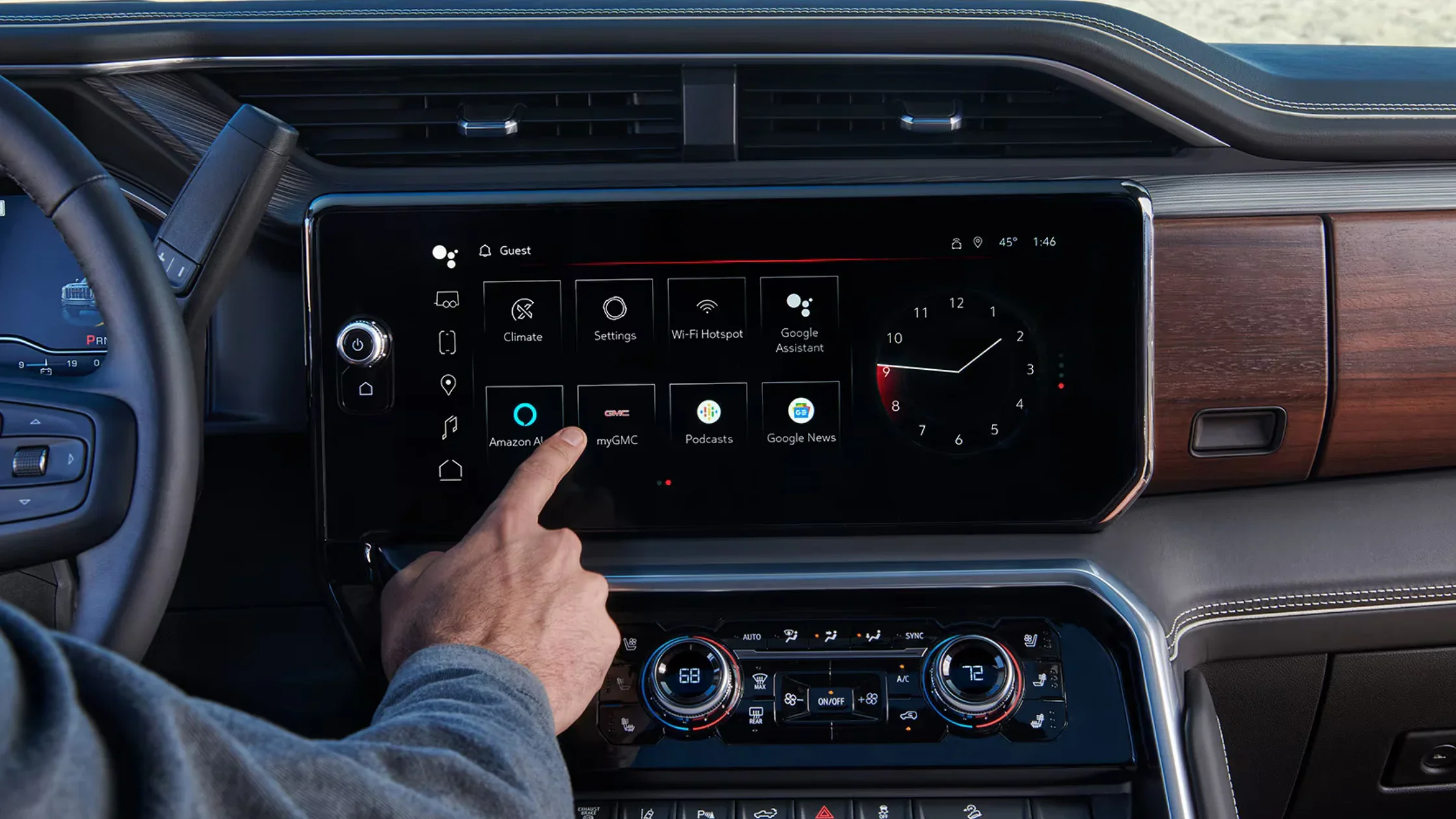 Close-up of 2025 GMC Sierra HD touchscreen with Amazon Alexa and infotainment apps displayed