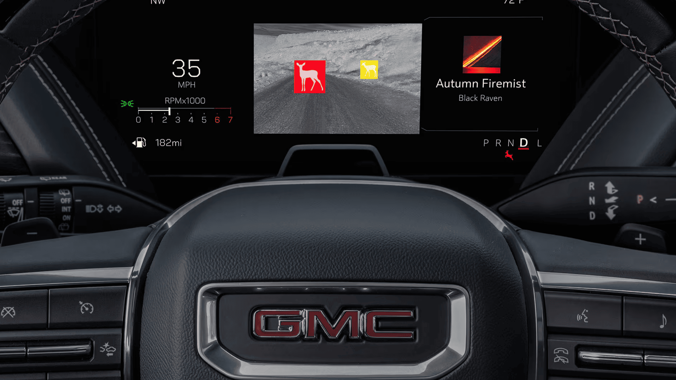 GMC Yukon digital gauge cluster showing wildlife detection and tachometer display.