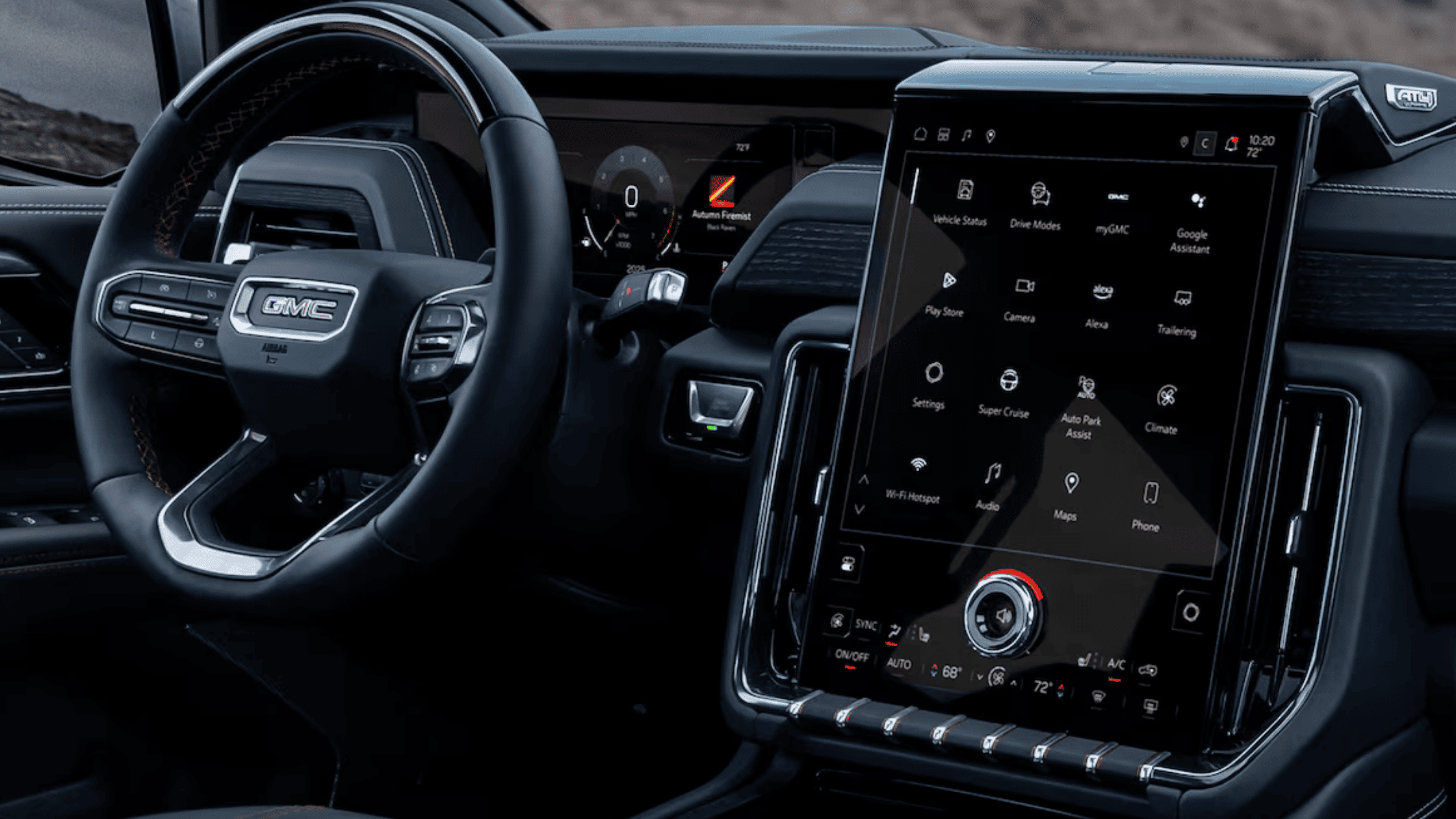 Driver cockpit of 2025 GMC Yukon showing infotainment screen, digital dashboard, and steering controls.