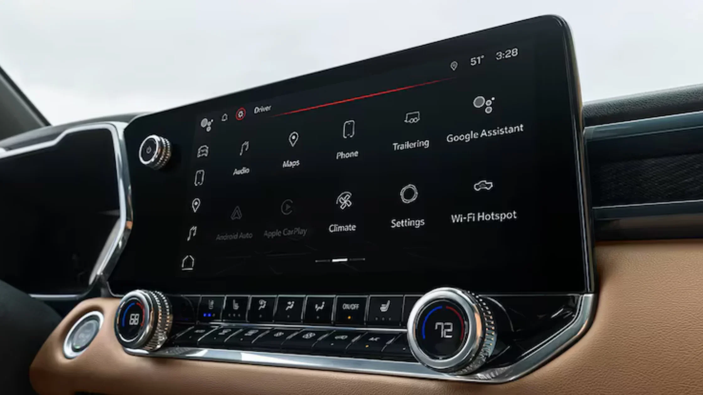 Close-up of 2026 GMC Canyon infotainment screen showing settings, trailer, climate, and app icons.