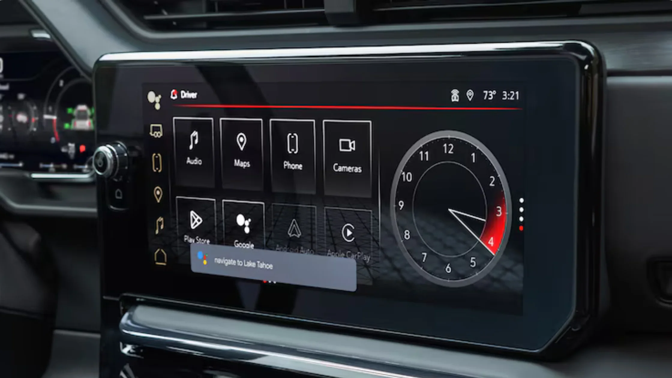 Close-up of 2026 GMC Sierra 1500 infotainment screen with Google apps, clock, and modern interface.